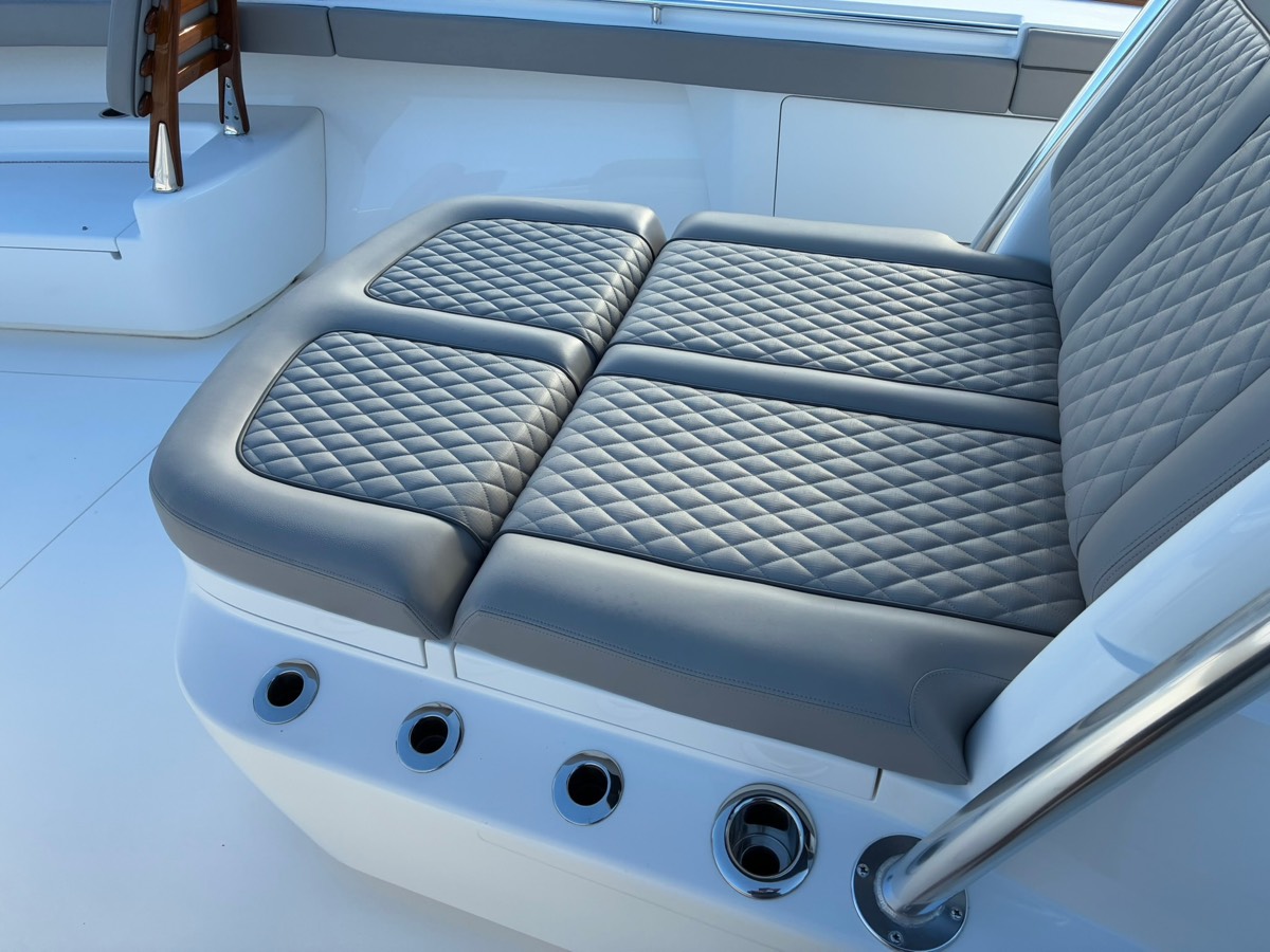 Valhalla V-41 aft bench rebuilt in grey diamond-stitch marine upholstery