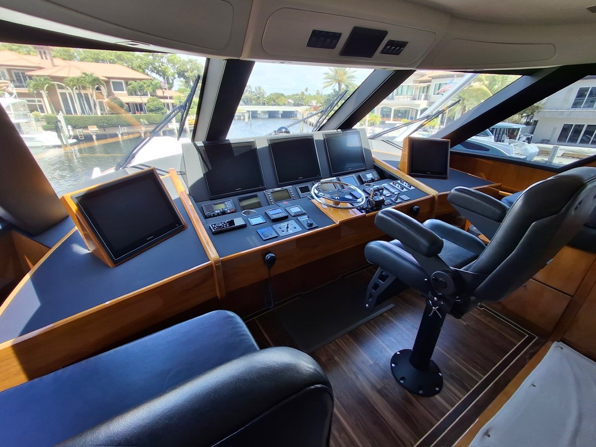 Viking 72 bridge helm chairs reupholstered in navy leather