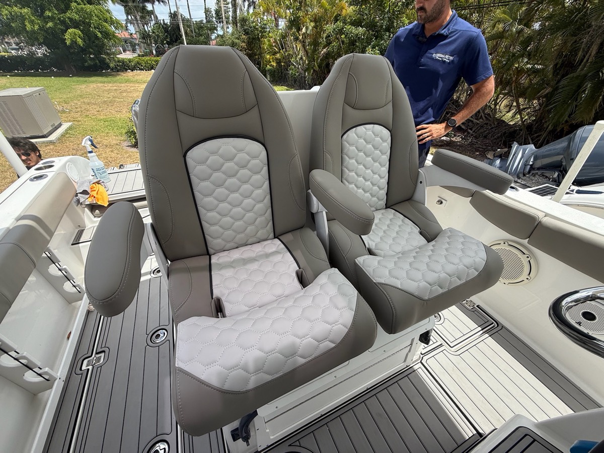 Sea Fox helm bolster seats rebuilt in grey and white marine upholstery